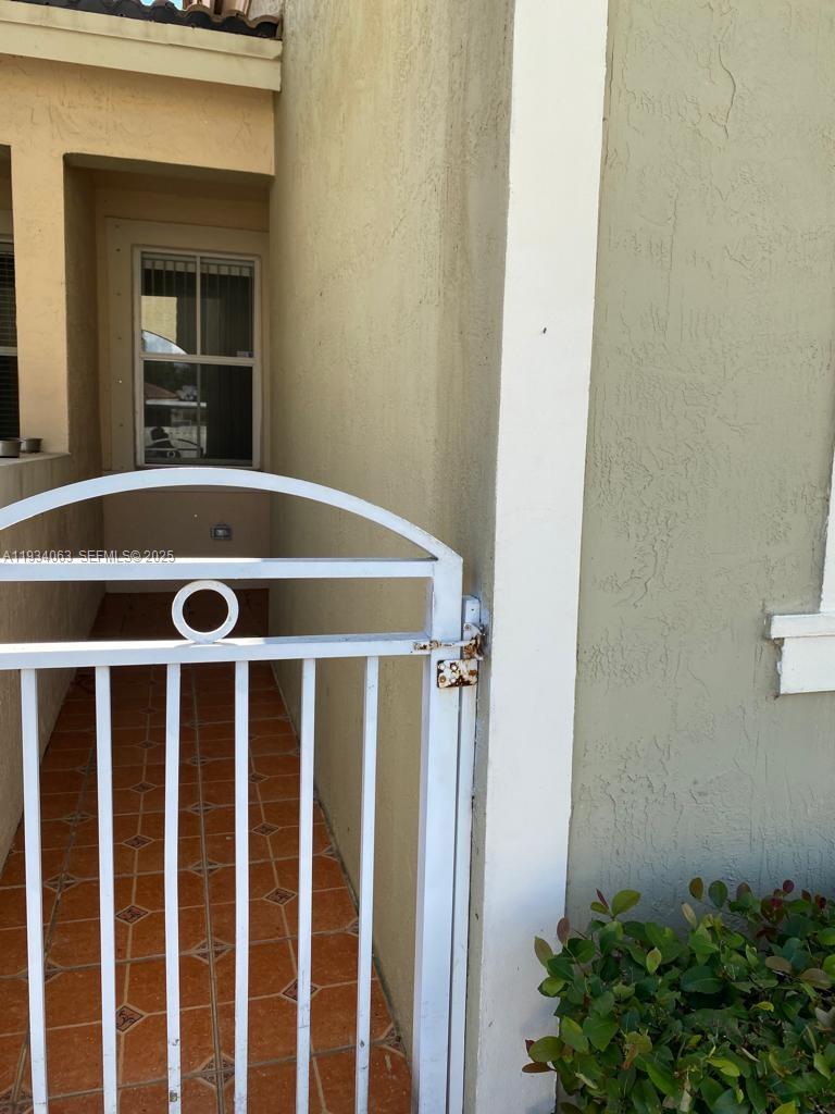 11024 Southwest 237th Lane Homestead, FL 33032 - Photo 2 of 16 a view of an outdoor space