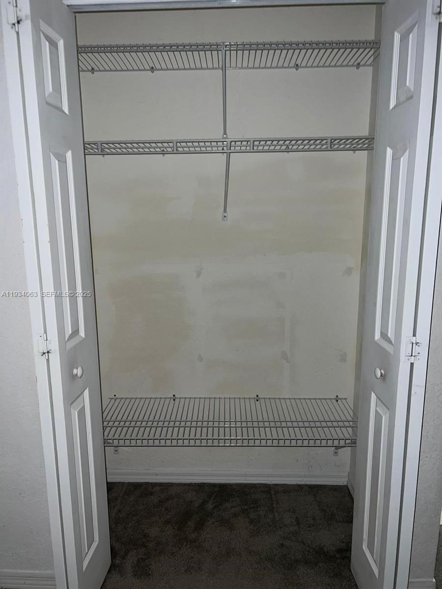 11024 Southwest 237th Lane Homestead, FL 33032 - Photo 9 of 16 a view of a gate