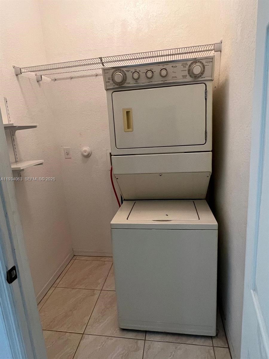 11024 Southwest 237th Lane Homestead, FL 33032 - Photo 10 of 16 a utility room with dryer and washer
