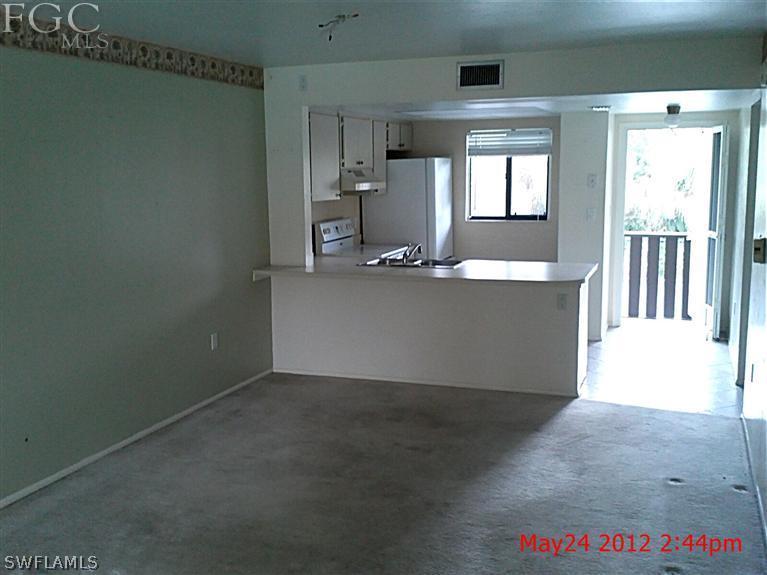 1231 Barrett Road, Unit 1004 North Fort Myers, FL 33903 - Photo 12 of 12 wooden floor and window in a room