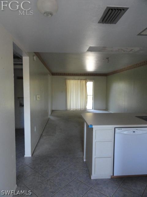 1231 Barrett Road, Unit 1004 North Fort Myers, FL 33903 - Photo 2 of 12 an empty room with windows