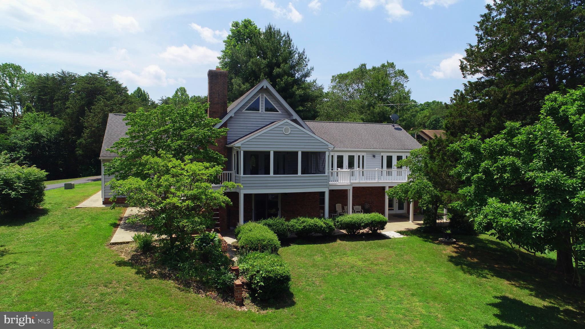 737 Plum Tree Road Bumpass, VA 23024 - Photo 1 of 46 Lake Side of Home