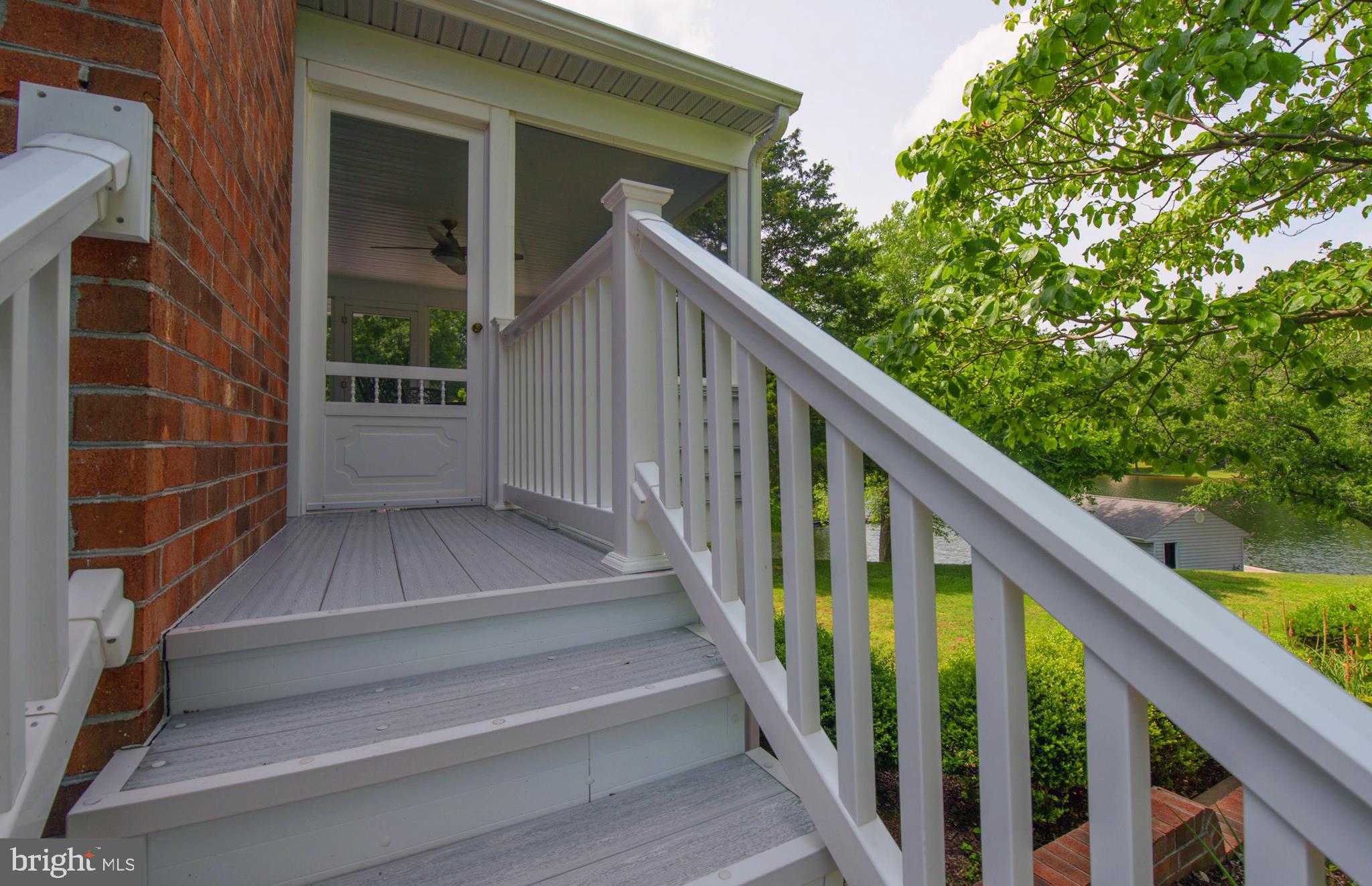 737 Plum Tree Road Bumpass, VA 23024 - Photo 29 of 46 Stairs to screened in porch