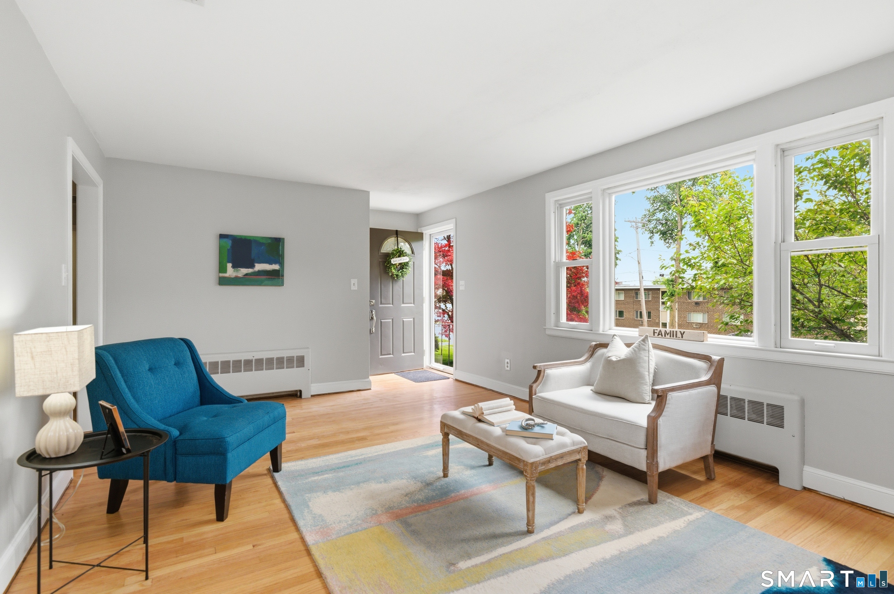 149 Mill Street Wethersfield, CT 06109 - Photo 3 of 29 a living room with furniture and a large window