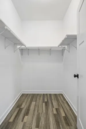 a view of a room with racks on the wall
