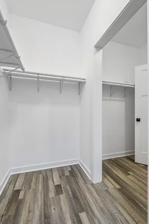 a view of an empty walk in closet