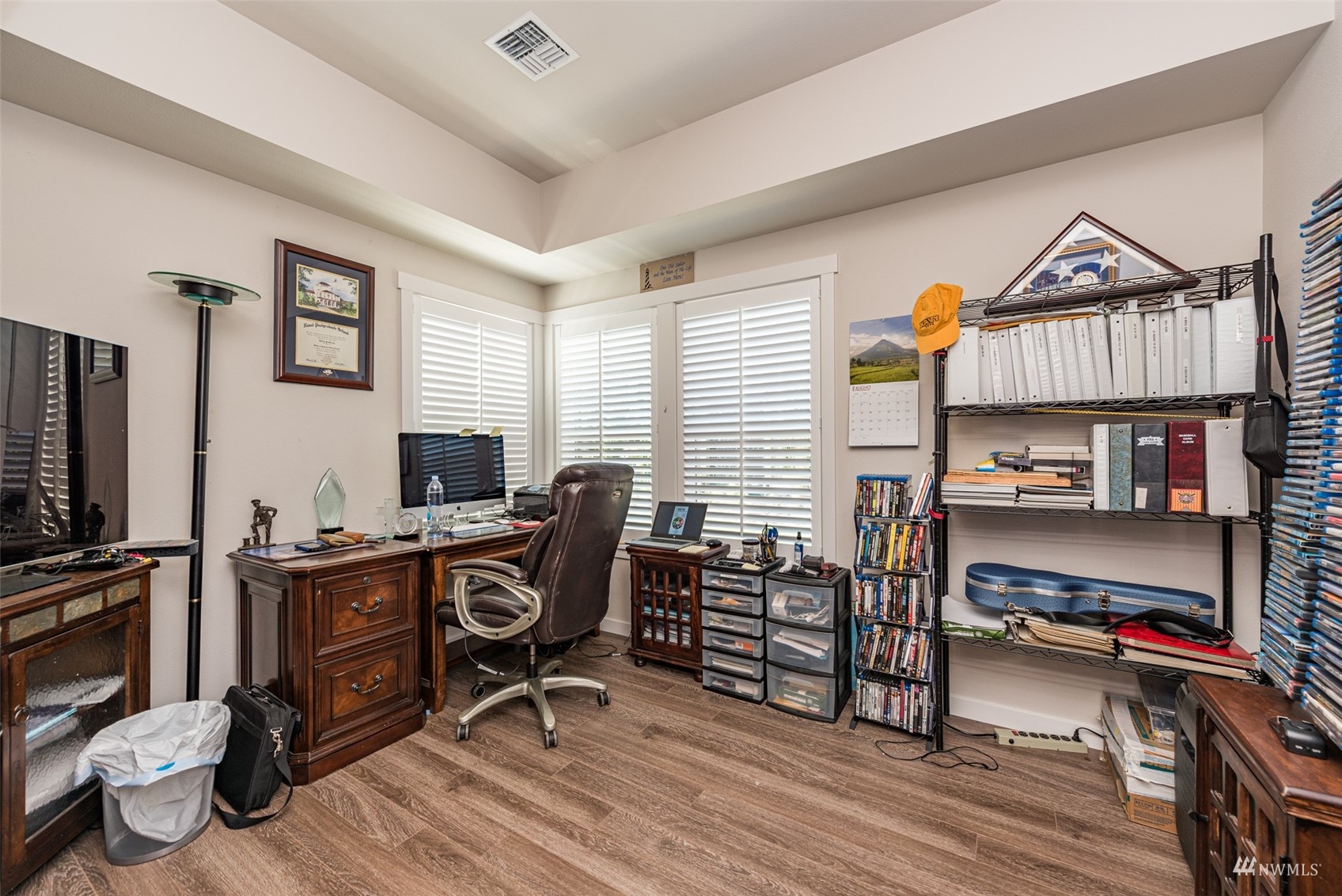 411 Jones Farm Road Sequim, WA 98382 - Photo 28 of 40 a view of a workspace with furniture and a window