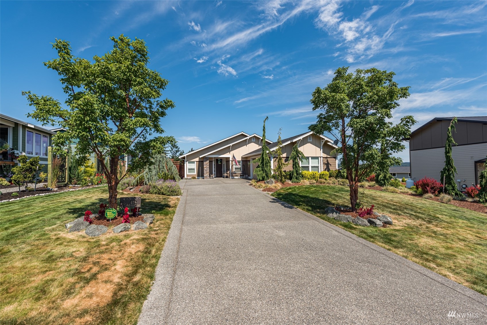 411 Jones Farm Road Sequim, WA 98382 - Photo 3 of 40 a front view of a house with a yard