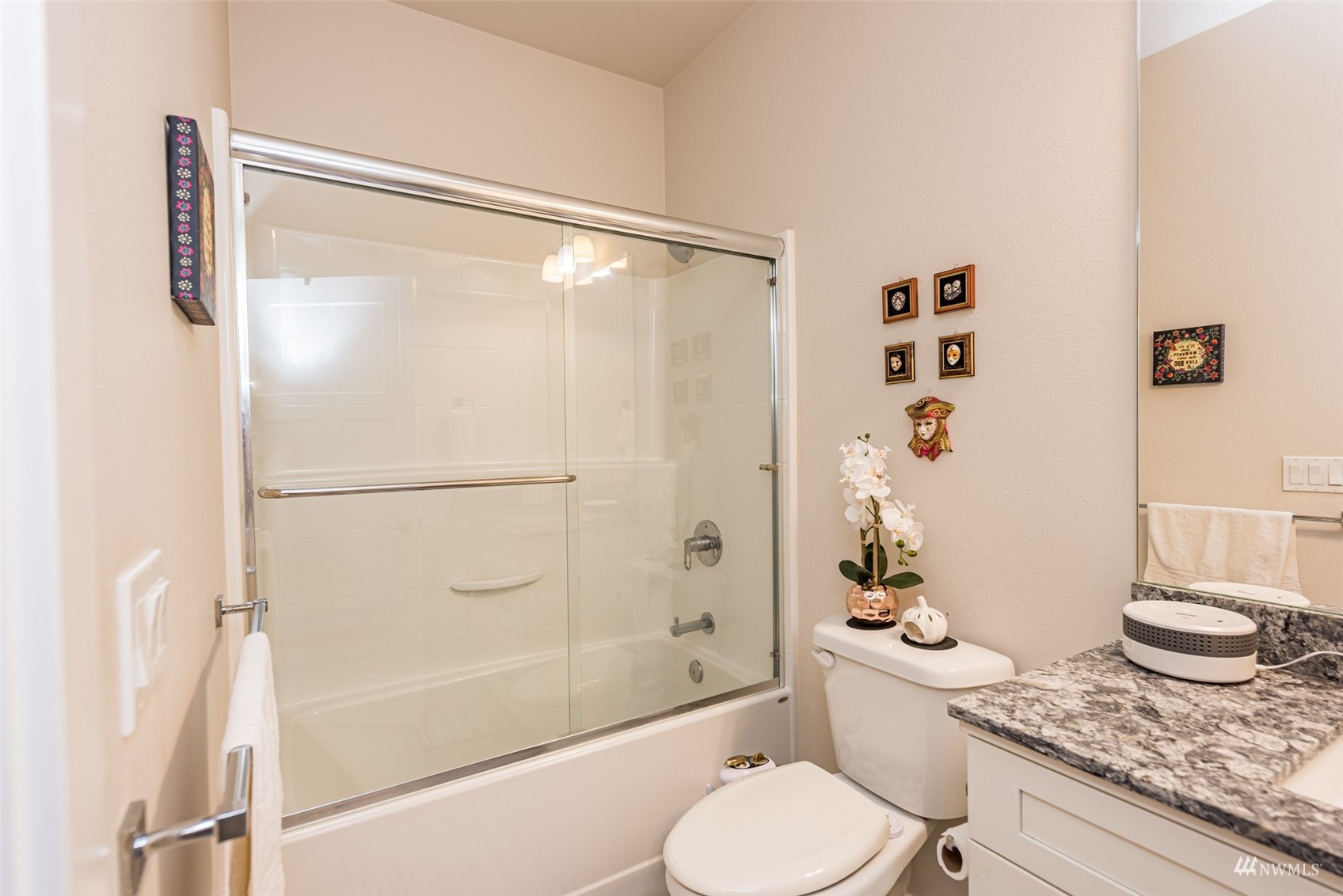 411 Jones Farm Road Sequim, WA 98382 - Photo 36 of 40 a bathroom with a granite countertop sink toilet and shower