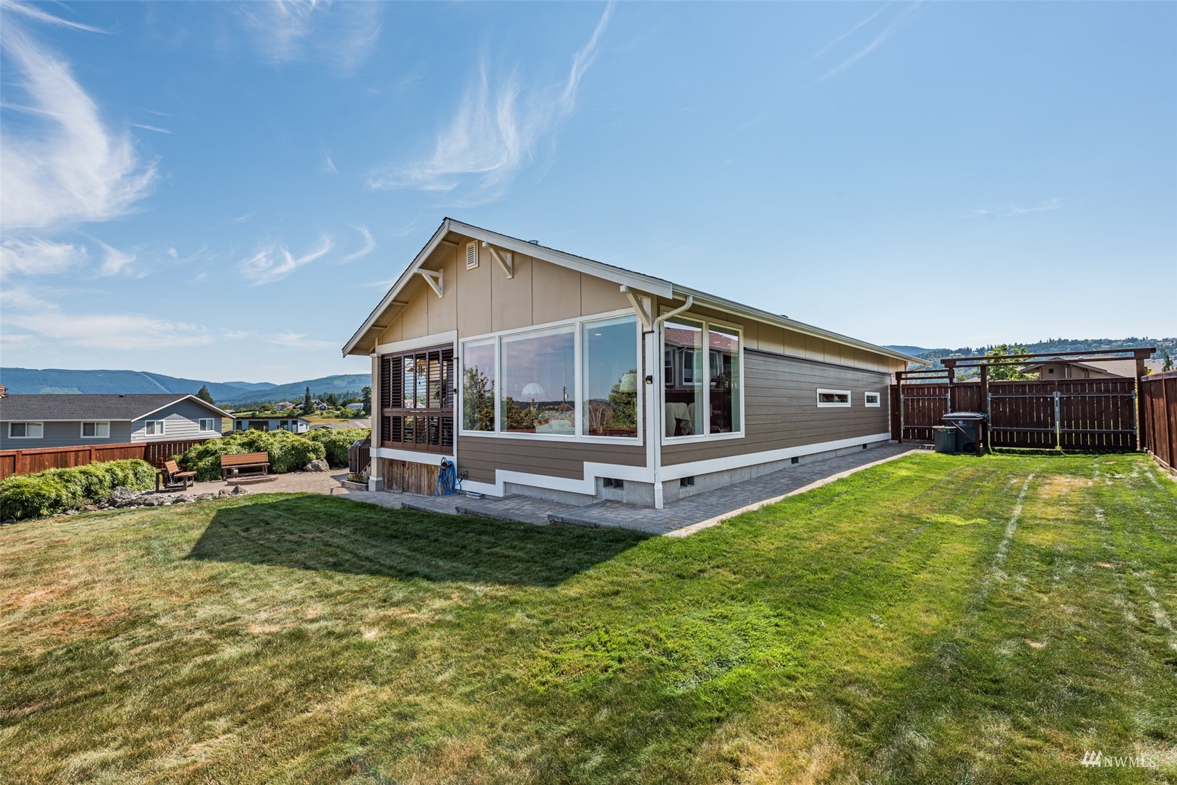 411 Jones Farm Road Sequim, WA 98382 - Photo 6 of 40 a view of a house with pool and a yard