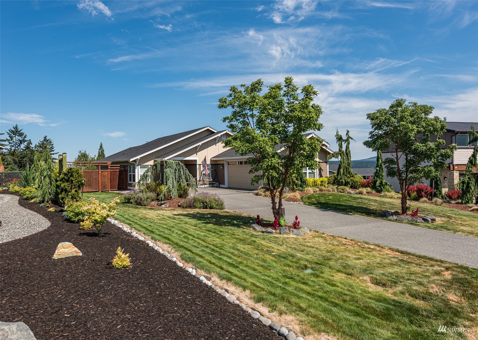 411 Jones Farm Road Sequim, WA 98382 - Photo 8 of 40 a front view of a house with a yard