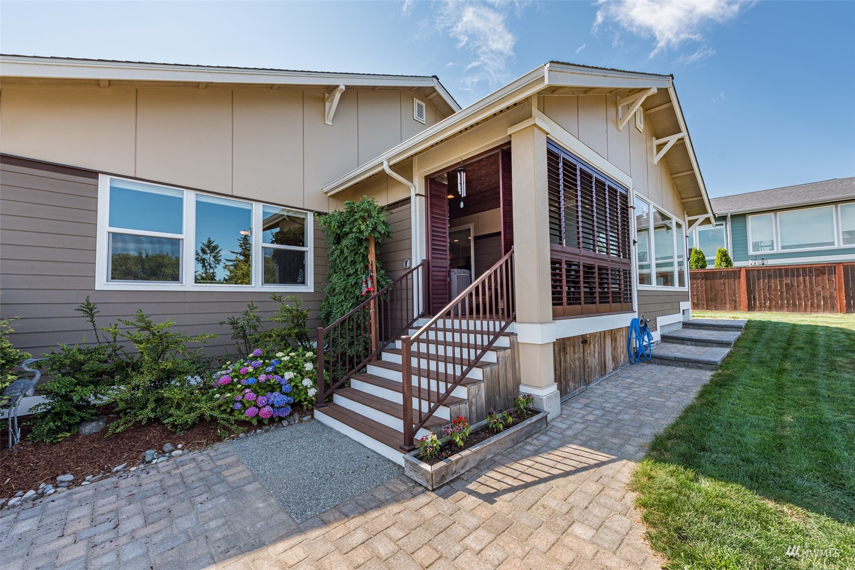 411 Jones Farm Road Sequim, WA 98382 - Photo 10 of 40 a front view of a house with a garden