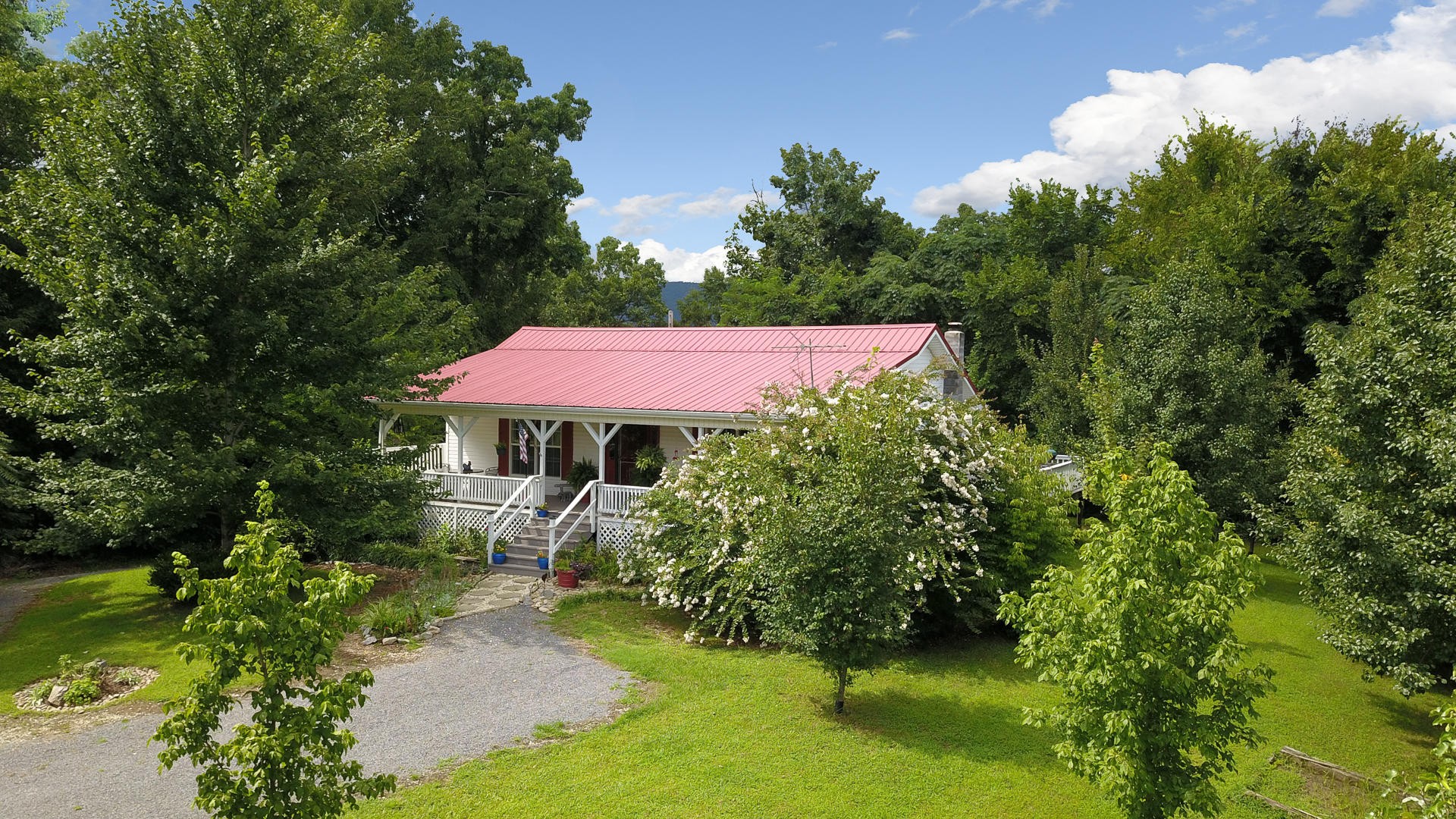 297 Lester Whitt Road Rutledge, TN 37861 - Photo 23 of 27 a view of a house with a yard