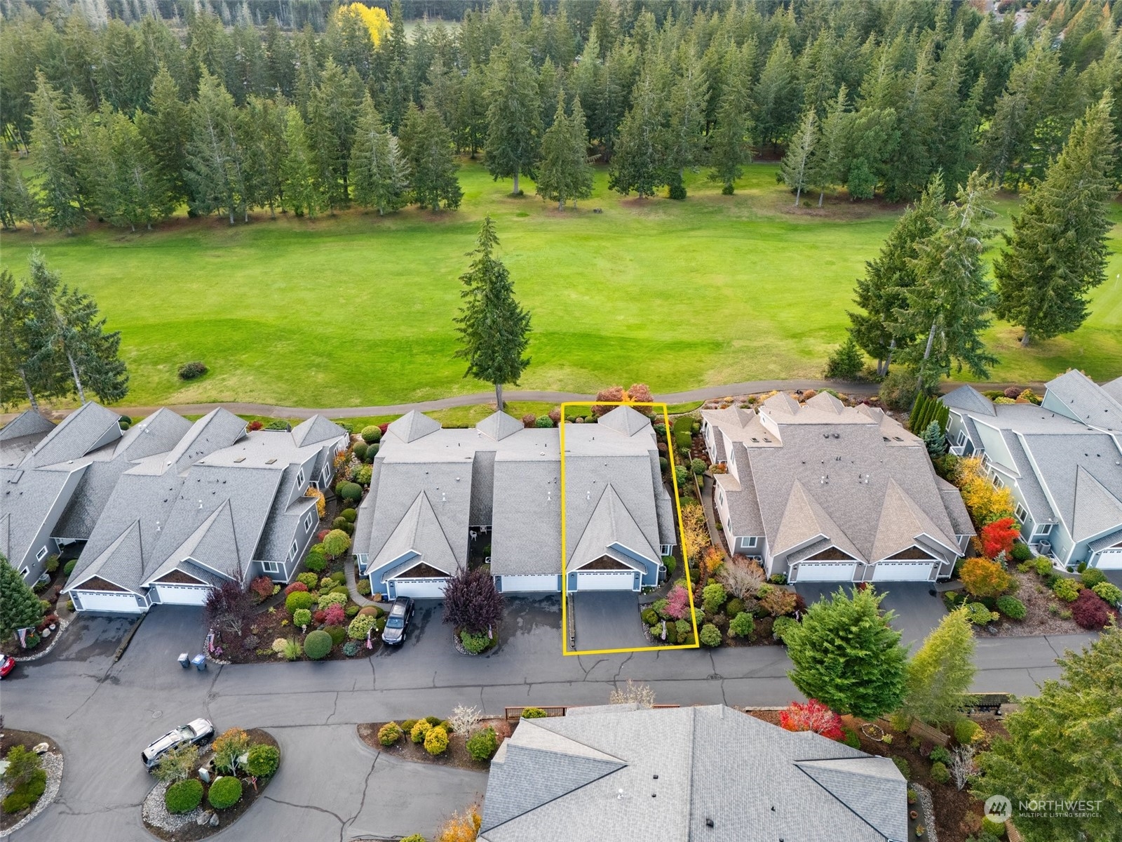 160 East Soderberg Road, Unit G18 Allyn, WA 98524 - Photo 1 of 36 an aerial view of a house with a garden and lake view