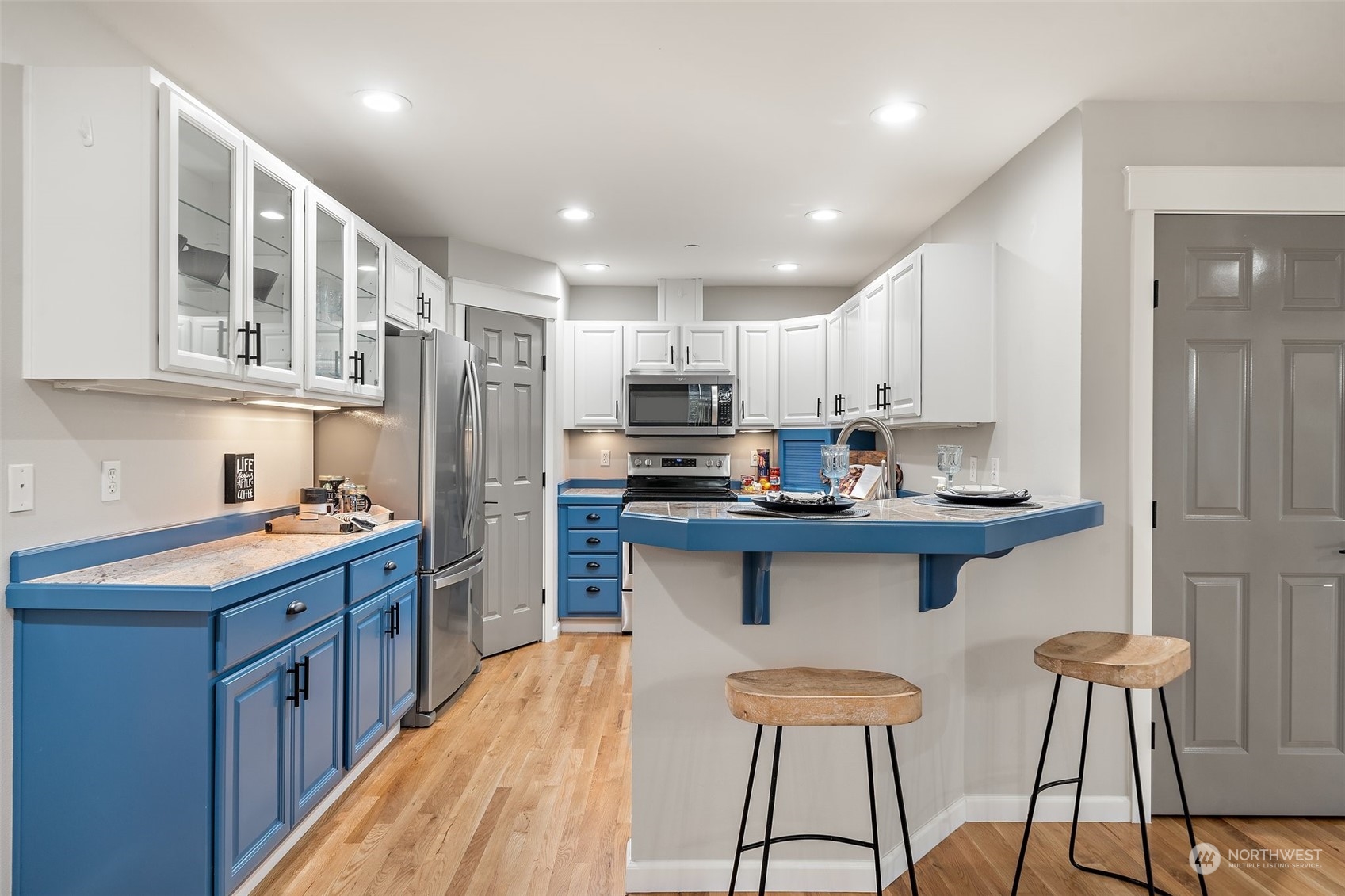 160 East Soderberg Road, Unit G18 Allyn, WA 98524 - Photo 11 of 36 a kitchen with stainless steel appliances granite countertop a refrigerator and a stove top oven