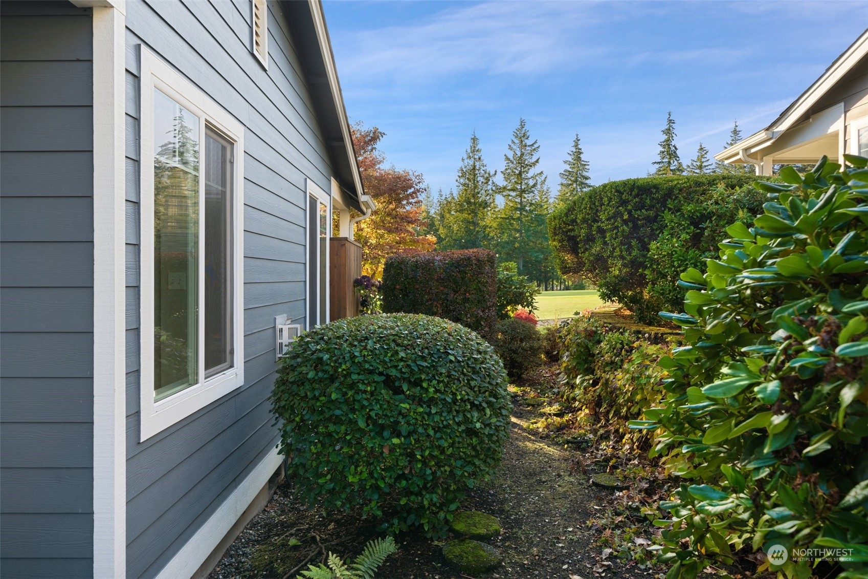 160 East Soderberg Road, Unit G18 Allyn, WA 98524 - Photo 28 of 36 a view of a yard in front of a house