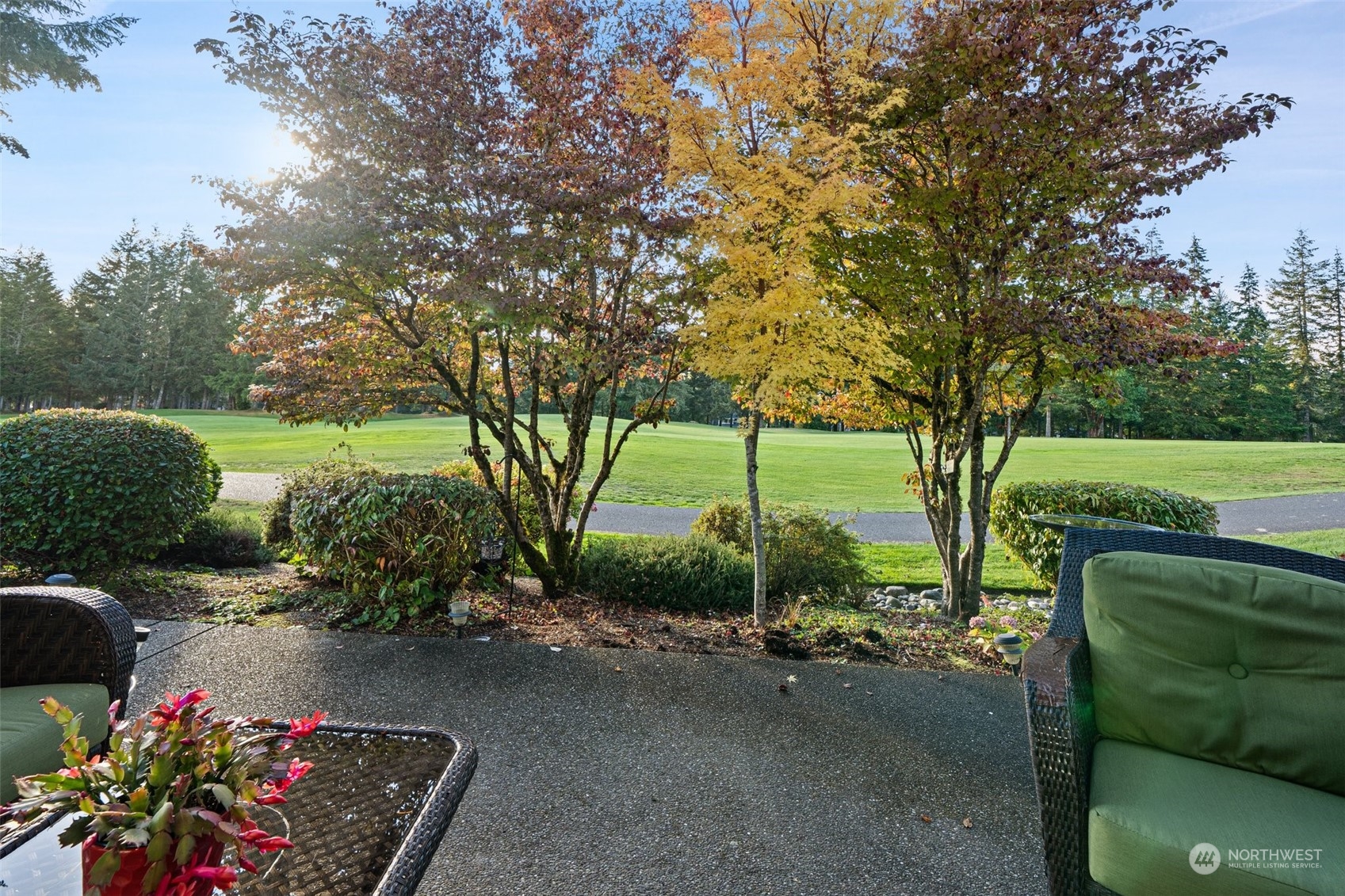 160 East Soderberg Road, Unit G18 Allyn, WA 98524 - Photo 8 of 36 a garden view with a seating space
