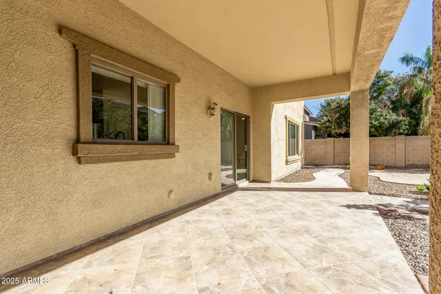 a view of a house with a yard and garage
