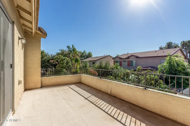 a spacious bathroom with a granite countertop sink a mirror and a