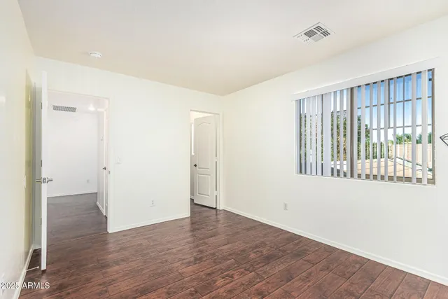 a view of a room with racks on the wall