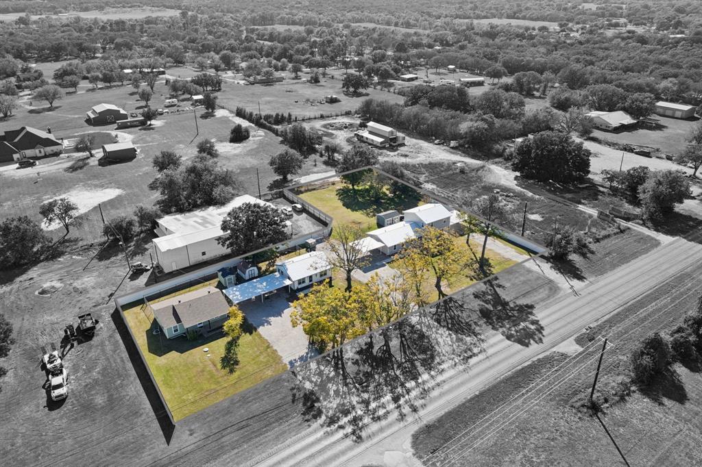 1060 East Reno Road Azle, TX 76020 - Photo 2 of 40 Turnkey cash-flowing 4-unit property with individual meters, fenced yards, recent full renovations, and expansion potential