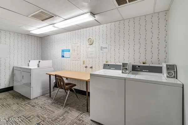 a bathroom with a granite countertop mirror