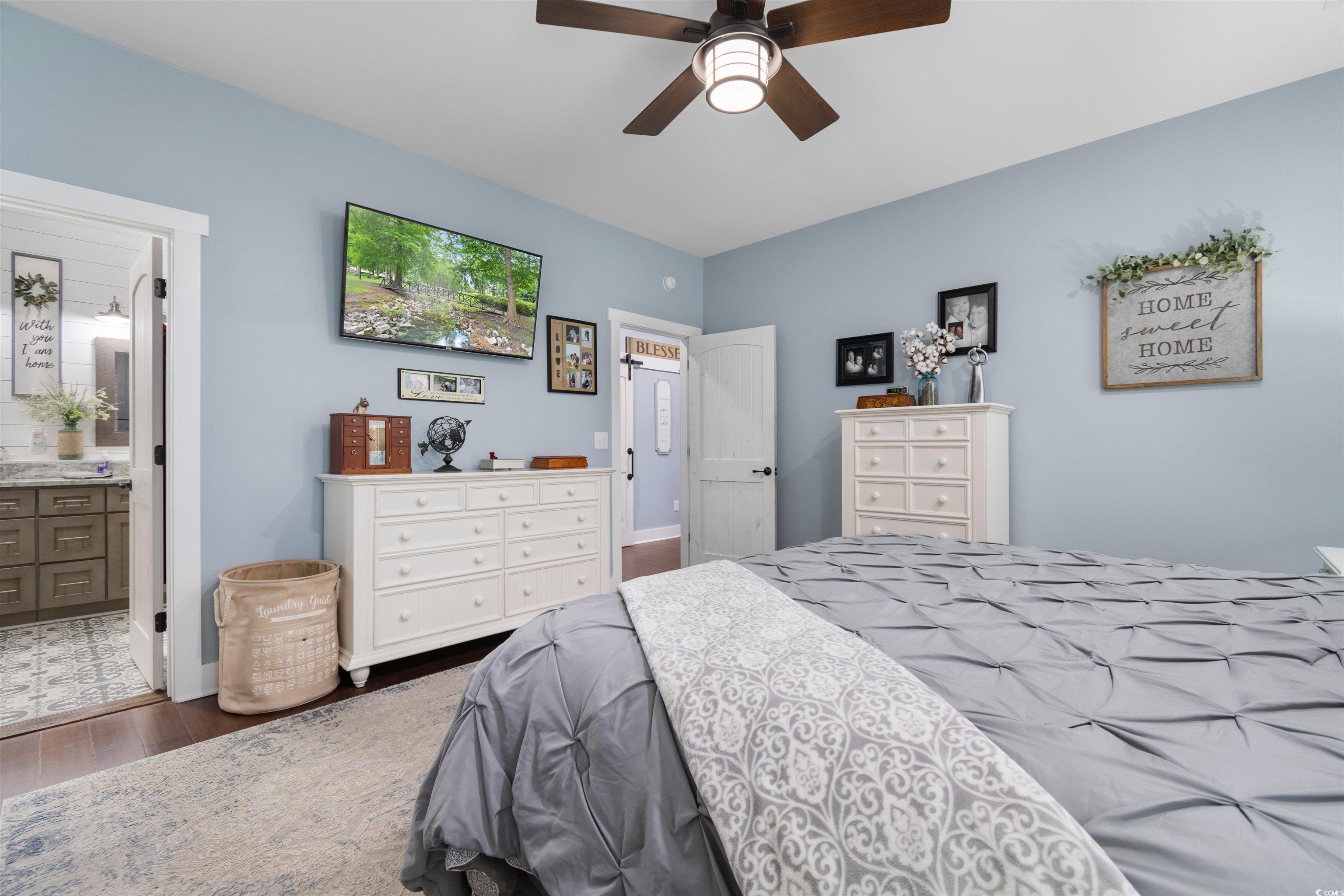 2901 Gause Road Loris, SC 29569 - Photo 19 of 37 Bedroom with wood-type flooring, connected bathroo