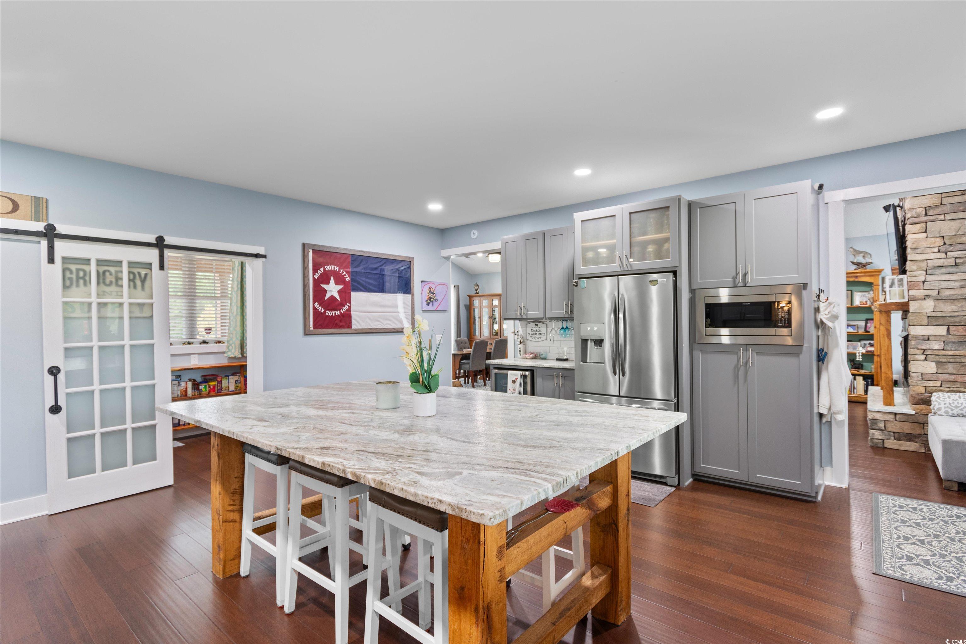 2901 Gause Road Loris, SC 29569 - Photo 7 of 37 Kitchen featuring gray cabinets, stainless steel a