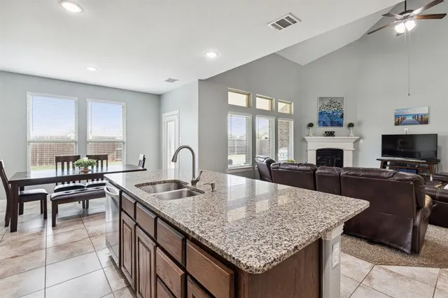 a kitchen with granite countertop lots of counter top space