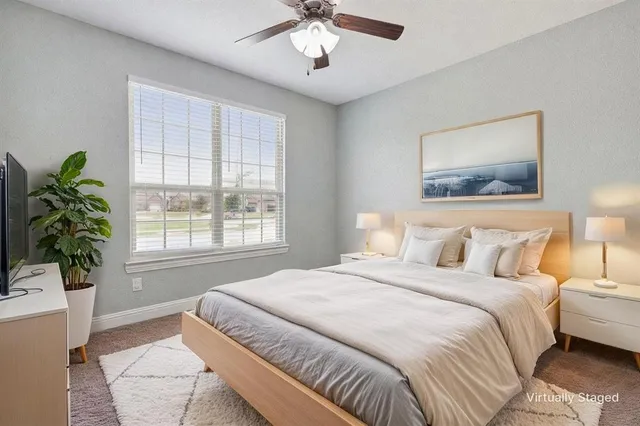 a bathroom with a double vanity sink toilet and a mirror