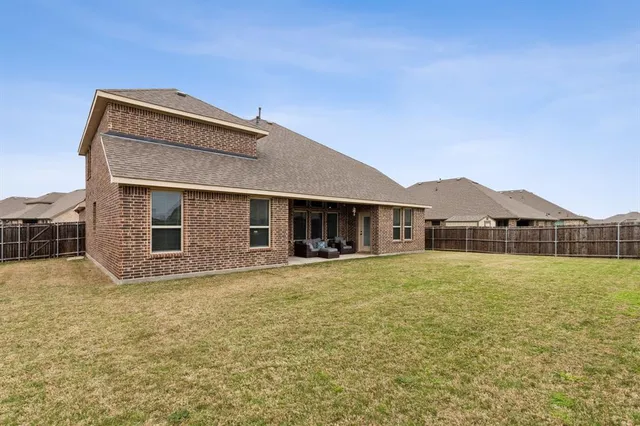 a view of outdoor space with a flat screen tv