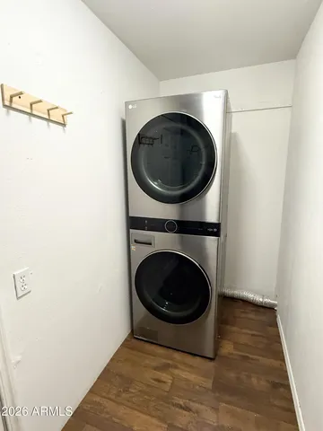 a view of a hallway with washer and dryer