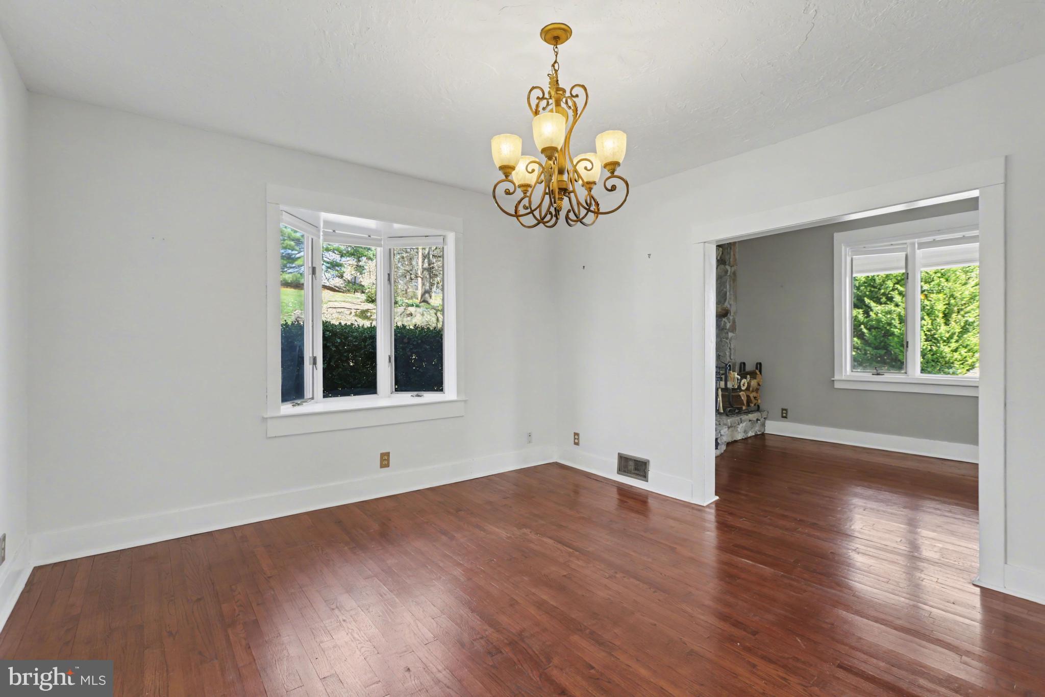 810 Copenhaffer Road York, PA 17404 - Photo 15 of 57 a view of an empty room with wooden floor and a window