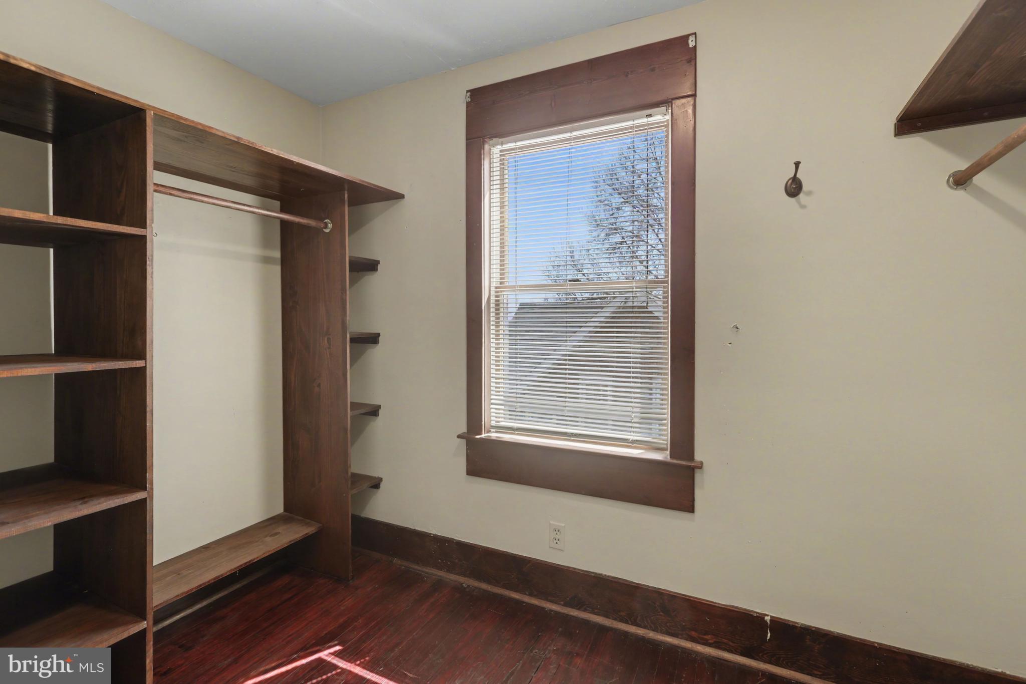 810 Copenhaffer Road York, PA 17404 - Photo 41 of 57 a room with a window and wooden floor