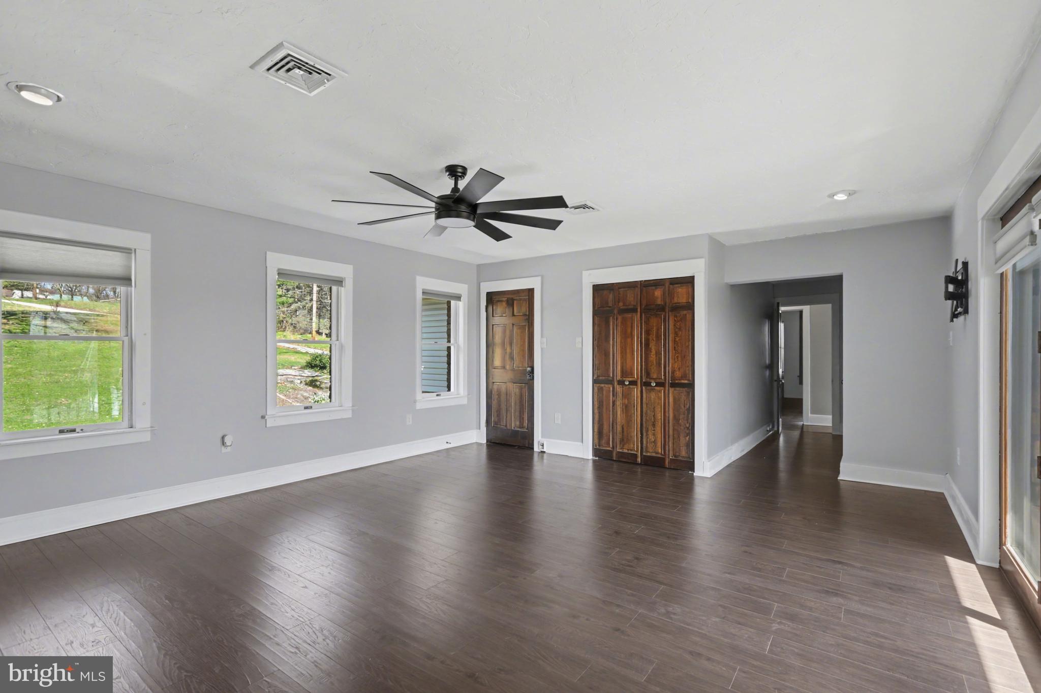 810 Copenhaffer Road York, PA 17404 - Photo 44 of 57 a view of an empty room with a window and wooden floor