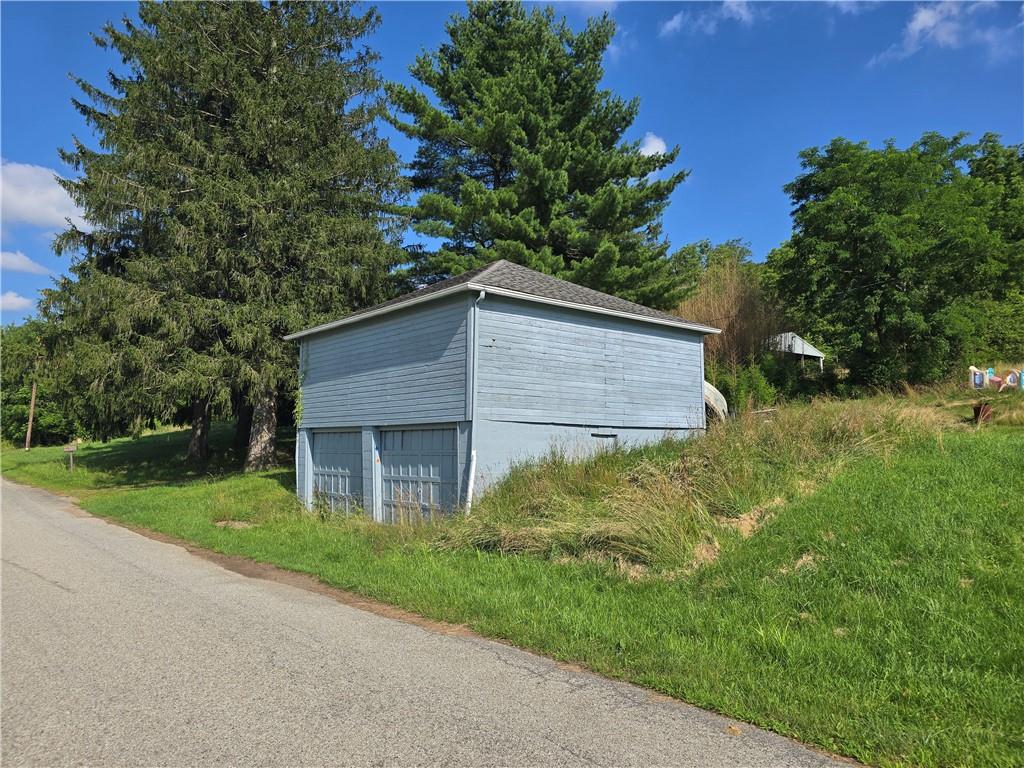 76 Rainey Road Eighty Four, PA 15330 - Photo 17 of 18 a view of a house with a yard
