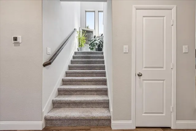 a view of an entryway with hallway