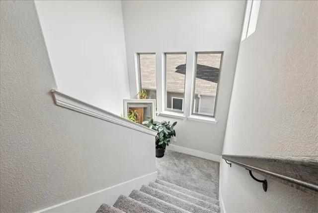 a view of balcony with wooden floor