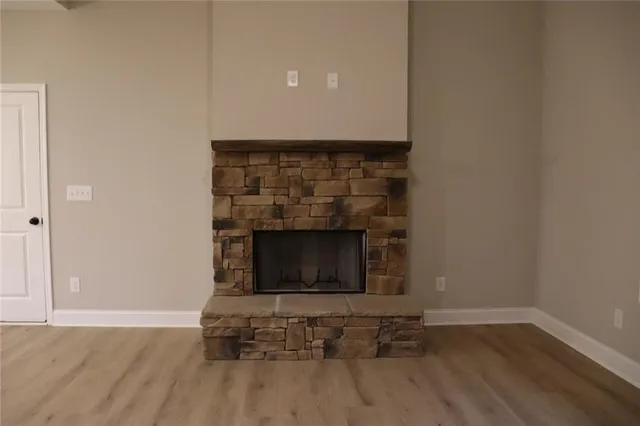 a living room with a fireplace