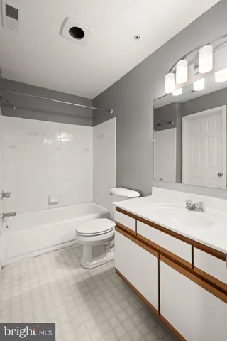 a bathroom with a sink a toilet and a bathtub