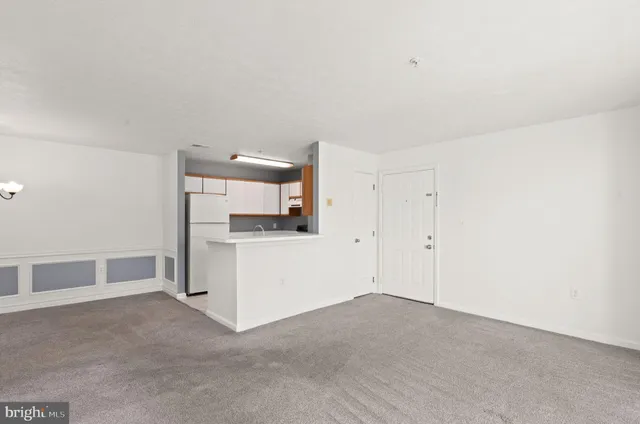 a view of a kitchen with a sink