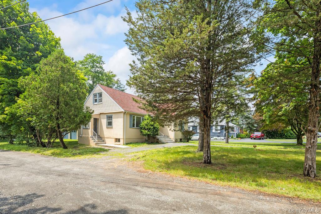 281-283 Old Haverstraw Road Congers, NY 10920 - Photo 41 of 41 a view of a house with a big yard and large trees