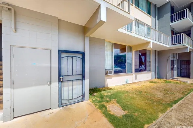 a view of swimming pool with brick walls and stairs