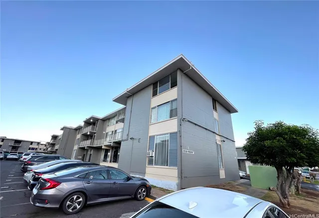 a car parked in front of a house