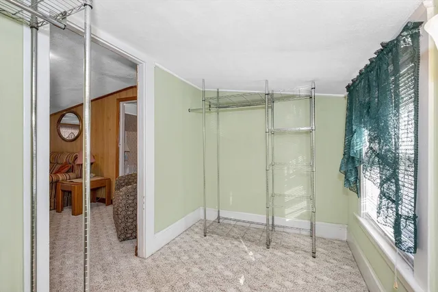 a bathroom with a shower and a sink