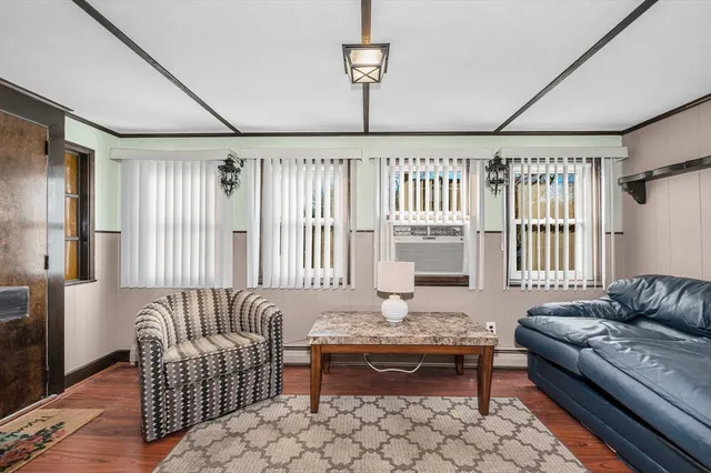 a living room with furniture fireplace and couch