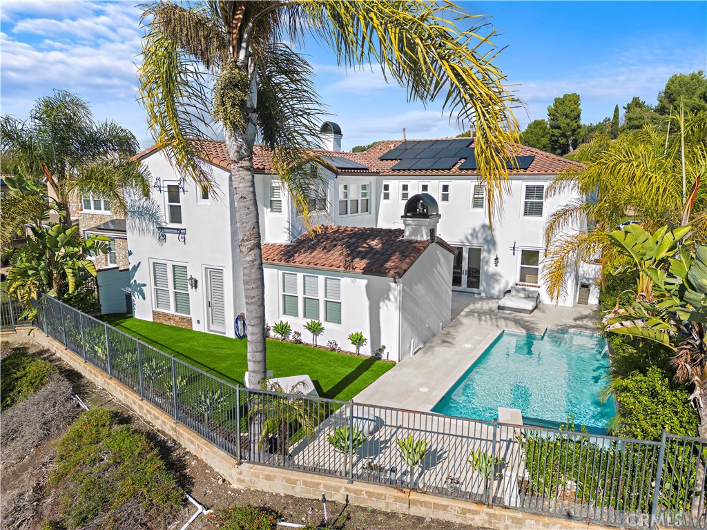 8 Kane Lane Ladera Ranch, CA 92694 - Photo 1 of 49 a front view of a house with garden