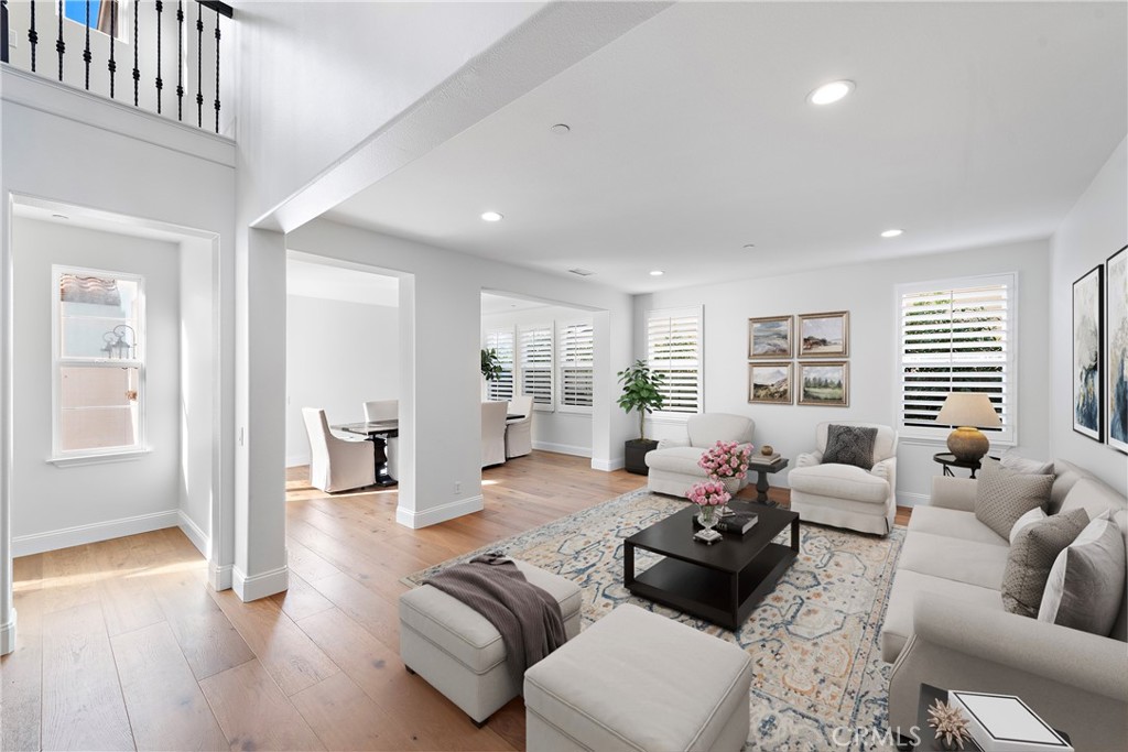 8 Kane Lane Ladera Ranch, CA 92694 - Photo 13 of 49 a living room with furniture or couch and a wooden floor