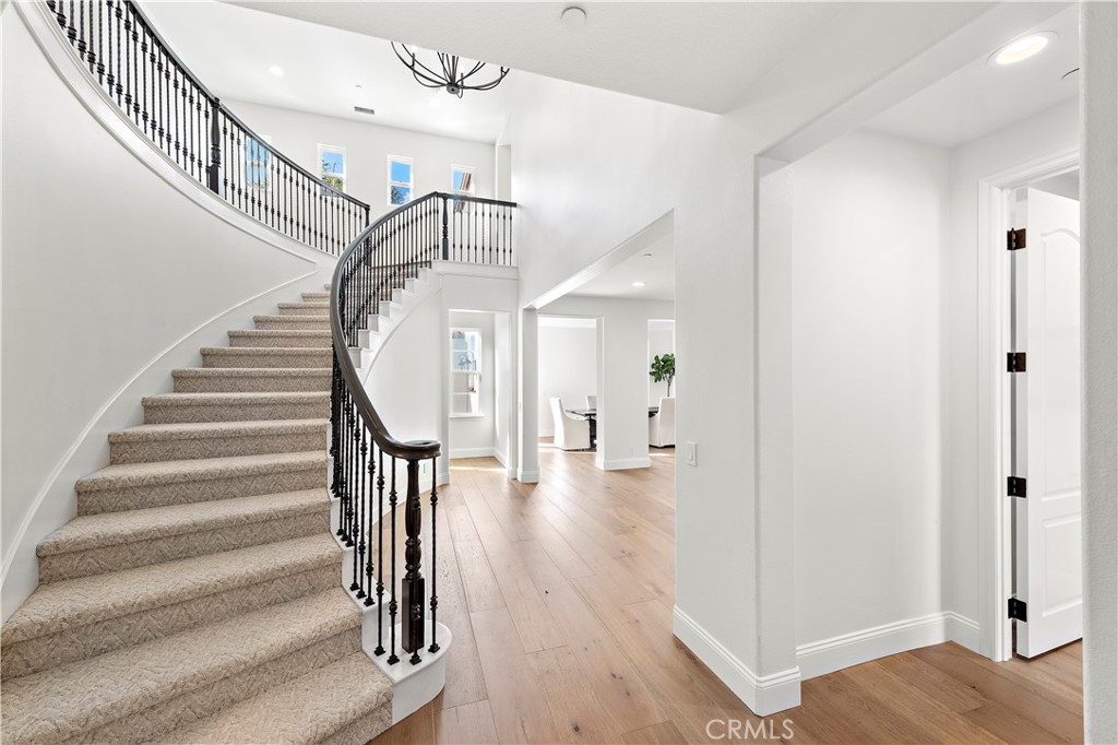8 Kane Lane Ladera Ranch, CA 92694 - Photo 14 of 49 a view of entryway and hall with wooden floor