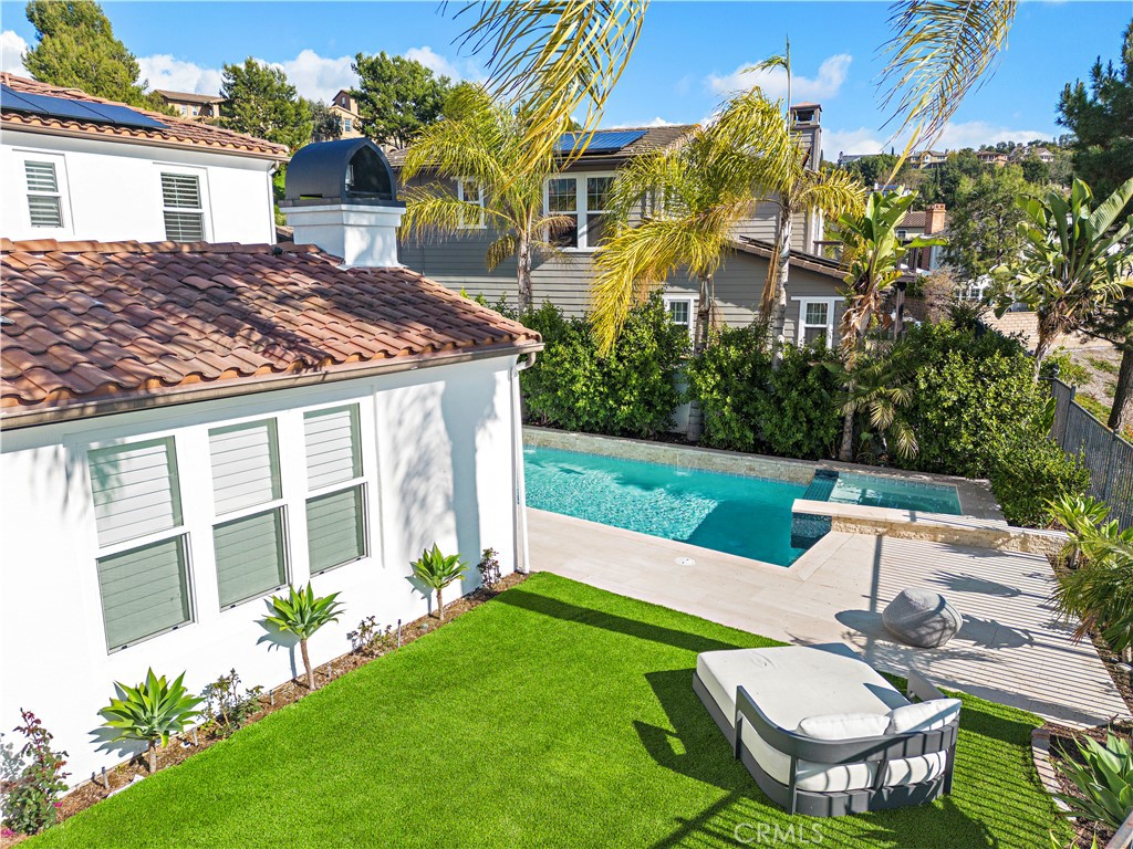 8 Kane Lane Ladera Ranch, CA 92694 - Photo 35 of 49 a view of a house with backyard sitting area and garden